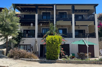 3+1 duplex apartment with sea and pool view in Babil Gardens Site