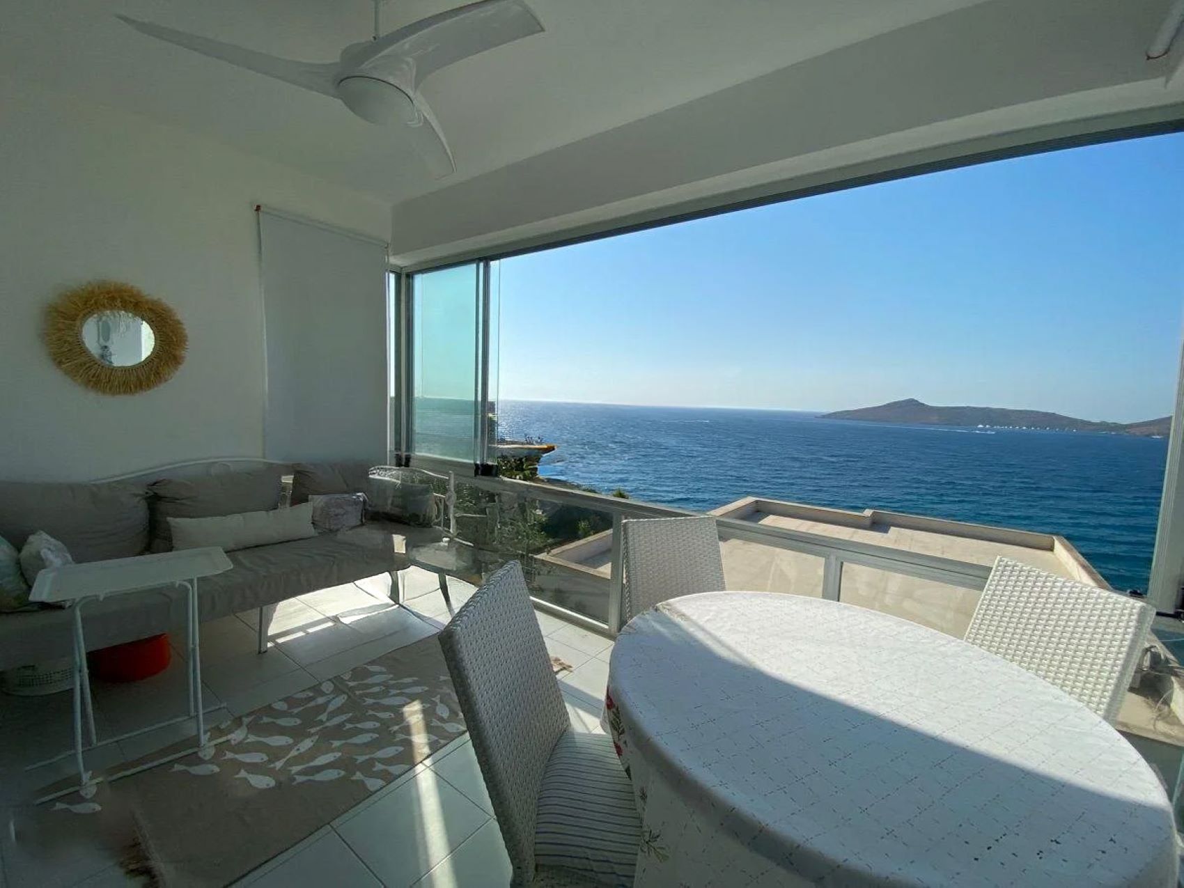 Seafront Apartment with Panoramic Sea and Islands View, Private Beach Access, and Located in a Secure Complex