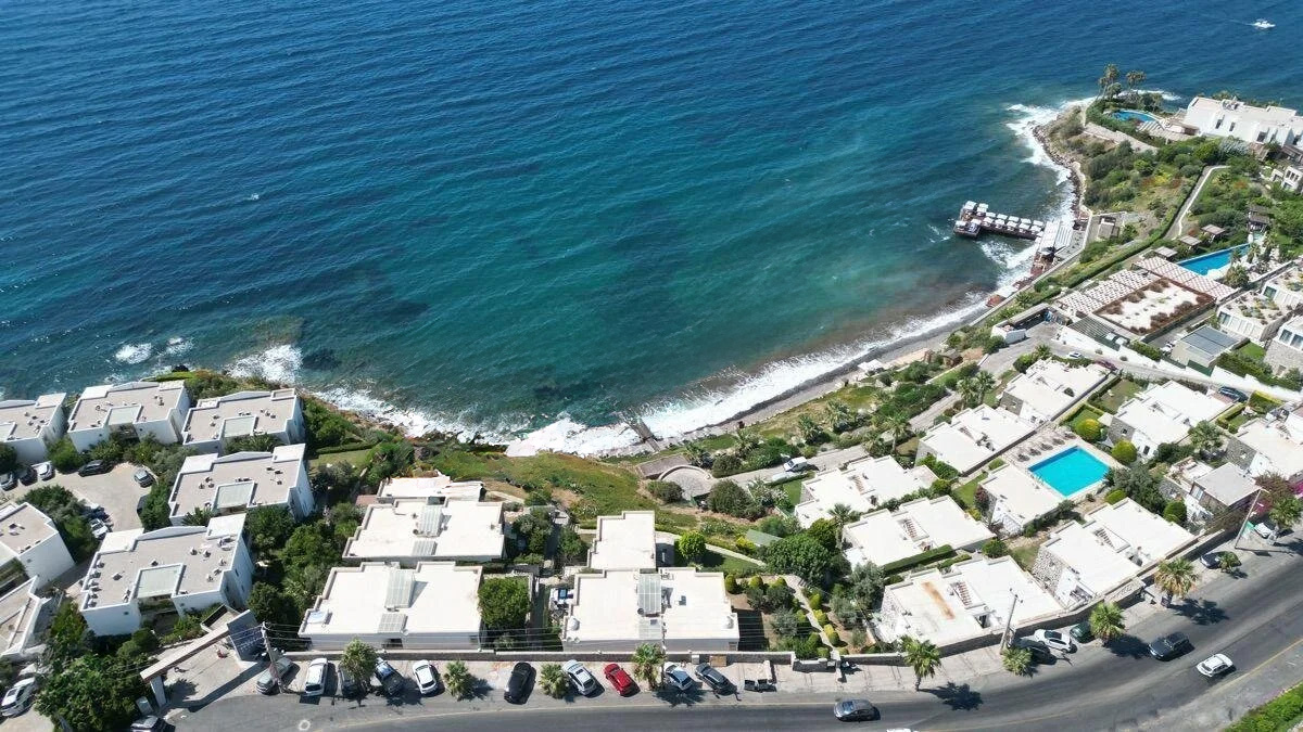 Seafront Apartment with Panoramic Sea and Islands View, Private Beach Access, and Located in a Secure Complex