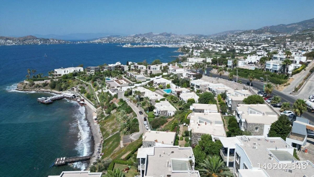 Seafront Apartment with Panoramic Sea and Islands View, Private Beach Access, and Located in a Secure Complex