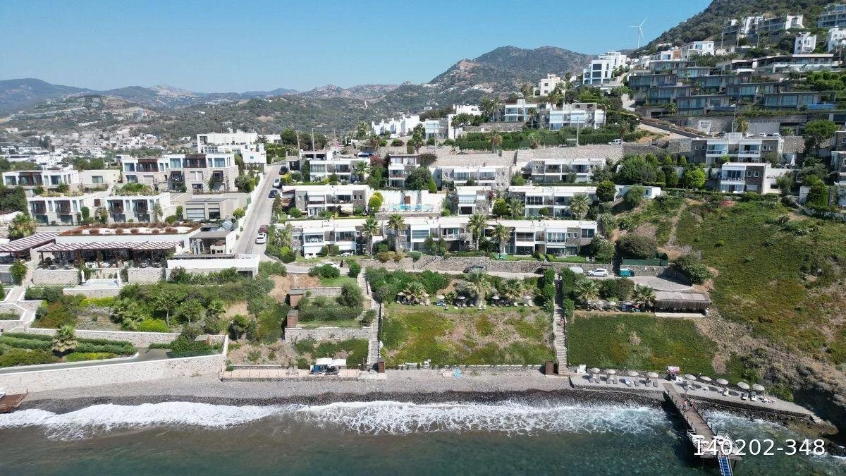 Seafront Apartment with Panoramic Sea and Islands View, Private Beach Access, and Located in a Secure Complex