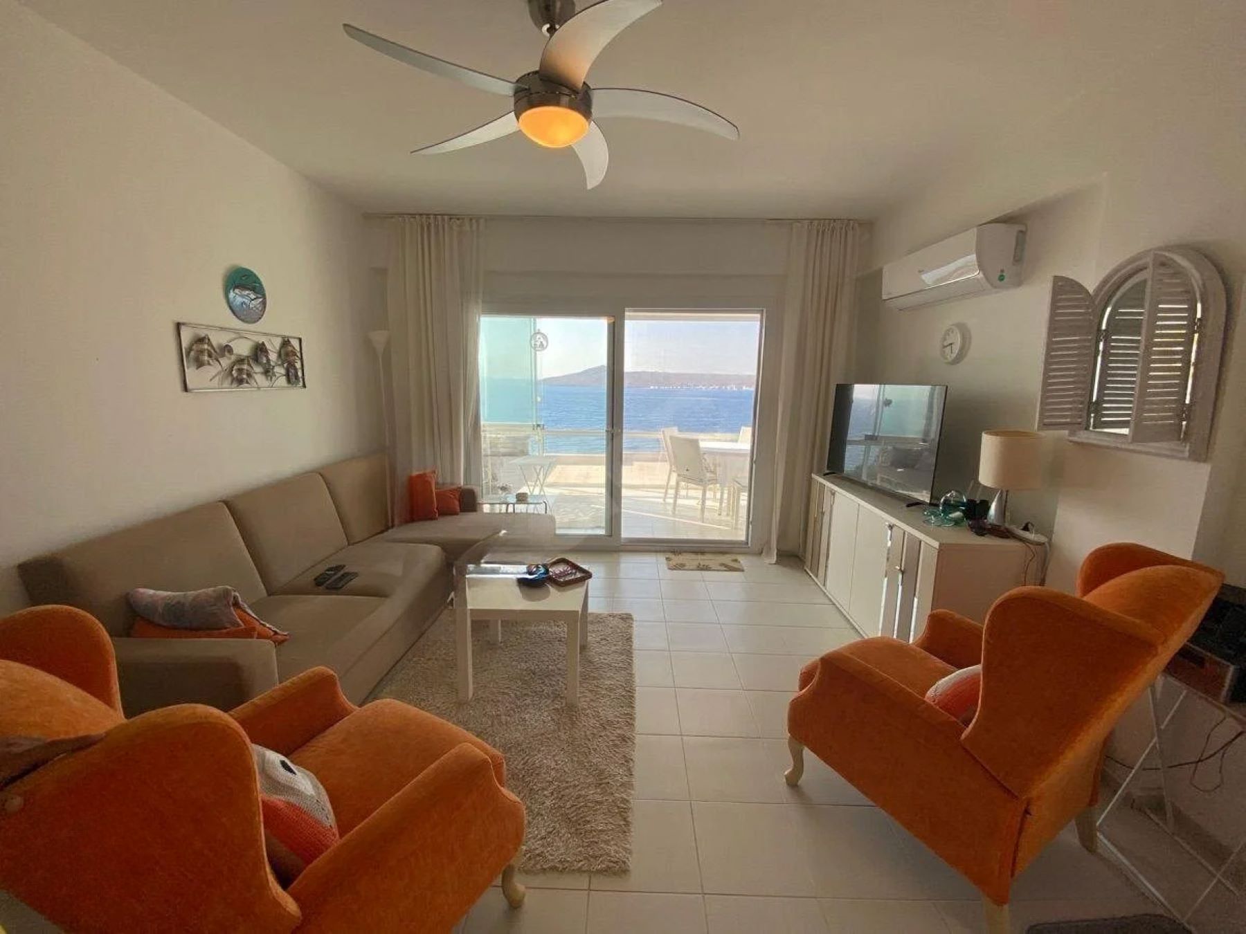 Seafront Apartment with Panoramic Sea and Islands View, Private Beach Access, and Located in a Secure Complex